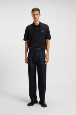 Split-logo relaxed-fit polo shirt in cotton piqu&eacute;, Black