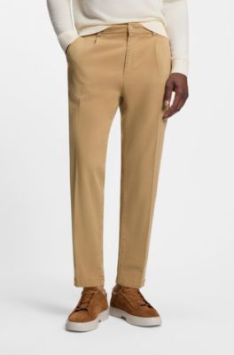 Pantalones tapered fit en sarga el&aacute;stica, Beige