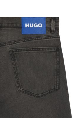 Jeans slim fit de denim el&aacute;stico negro lavado, Gris oscuro