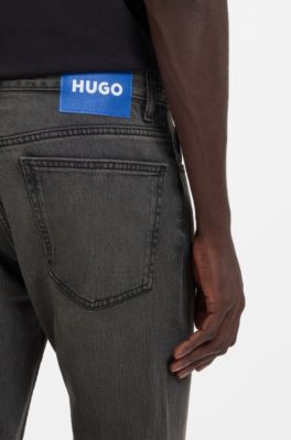 Jeans slim fit de denim el&aacute;stico negro lavado, Gris oscuro