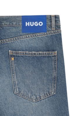 Jeans regular fit en denim azul con arrugas, Azul