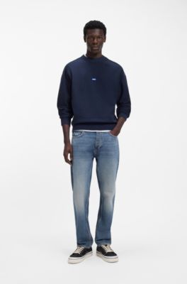 Jeans regular fit en denim azul con arrugas, Azul