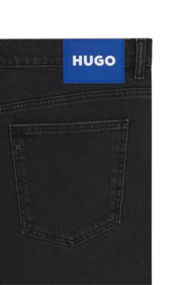 Black tapered-fit jeans in grain-effect denim, Black