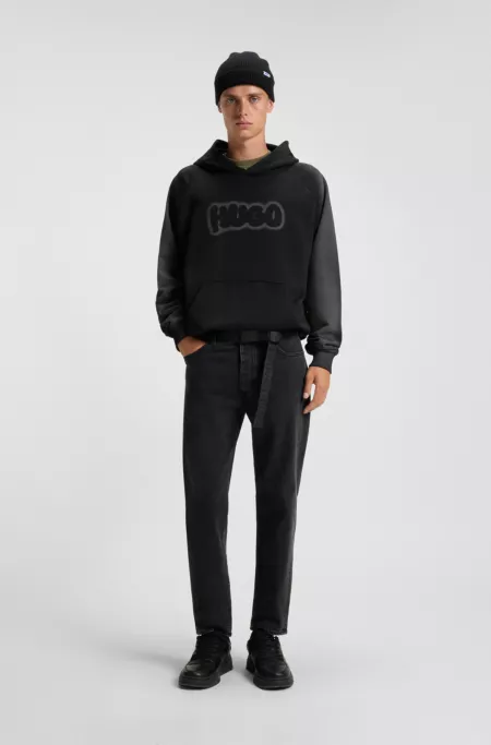 Black tapered-fit jeans in grain-effect denim