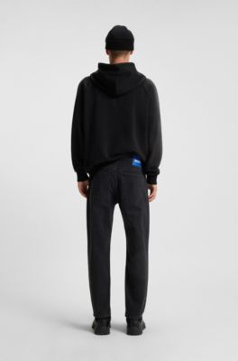 Black tapered-fit jeans in grain-effect denim, Black