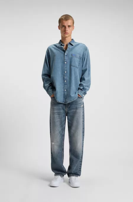 Blue baggy-fit jeans in distressed denim