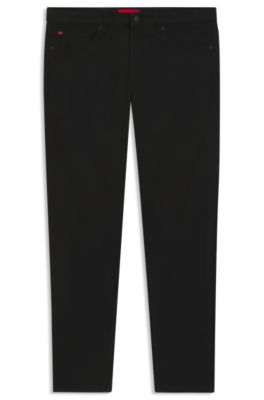 Jeans extra slim fit en denim negro de tacto satinado, Negro
