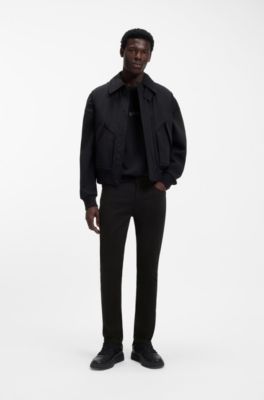 Jeans extra slim fit en denim negro de tacto satinado, Negro