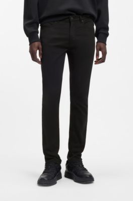 Jeans extra slim fit en denim negro de tacto satinado, Negro