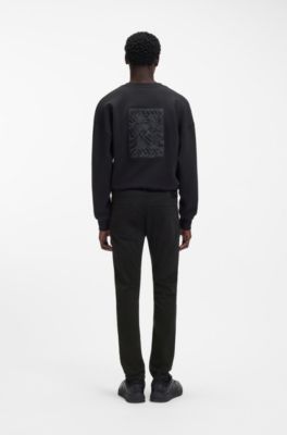 Jeans extra slim fit en denim negro de tacto satinado, Negro
