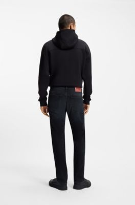 Jeans slim fit de denim el&aacute;stico en azul oscuro, Azul oscuro