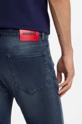 Jeans slim fit en c&oacute;modo denim el&aacute;stico azul de efecto vintage, Azul