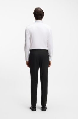 Pantalones slim fit en mezcla de lana el&aacute;stica t&eacute;cnica, Negro