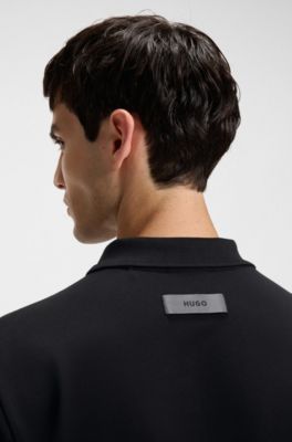 Polo relaxed fit de algod&oacute;n el&aacute;stico con cuello johnny, Negro