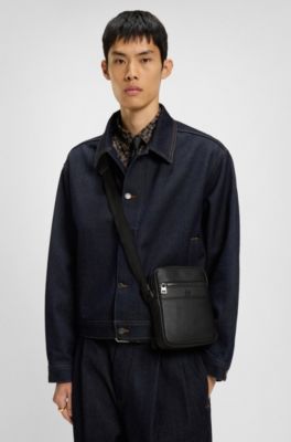 Grained reporter bag with stacked-logo trim, Black
