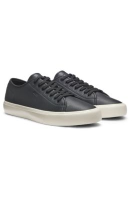 Low-top trainers in grained faux leather, Black