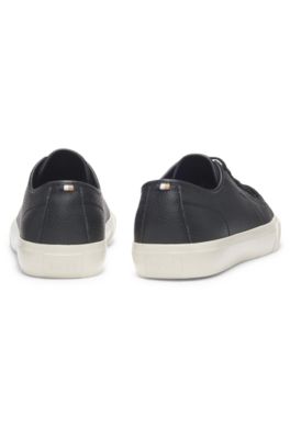 Low-top trainers in grained faux leather, Black