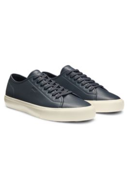 Low-top trainers in grained faux leather, Dark Blue