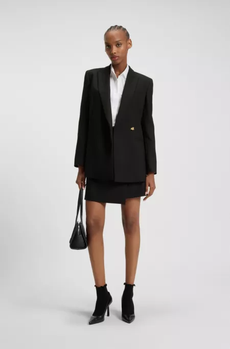 Wrap-front skirt with golden knot button