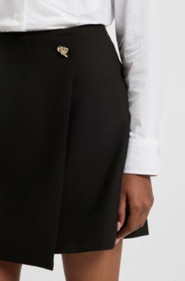 Wrap-front skirt with golden knot button, Black