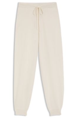 Cashmere tracksuit bottoms with cuffed hems, White