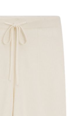 Cashmere tracksuit bottoms with cuffed hems, White