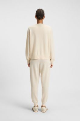 Cashmere tracksuit bottoms with cuffed hems, White
