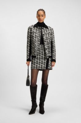 Minifalda en tweed con motivo de plumas, Fantas&iacute;a
