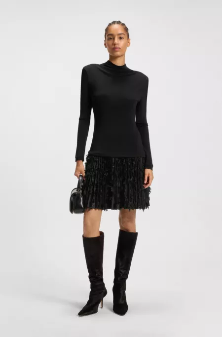 Jersey dress with feathered plissé pleats