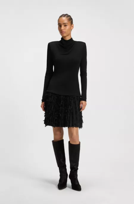 Jersey dress with feathered plissé pleats