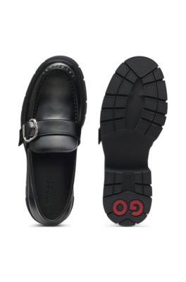 Buckled-strap loafers in leather, Black