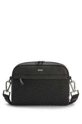 Sac port&eacute; crois&eacute; &agrave; d&eacute;tails monogramm&eacute;s, Noir