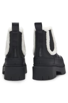Bottines en cuir avec finition en fourrure synth&eacute;tique, Noir