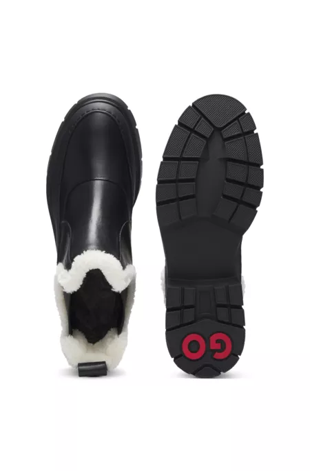 Leather Chelsea boots with faux-fur trim