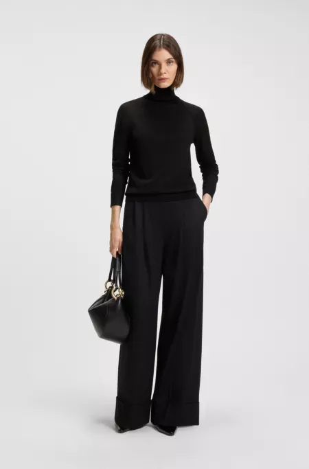 Rollneck sweater in merino wool