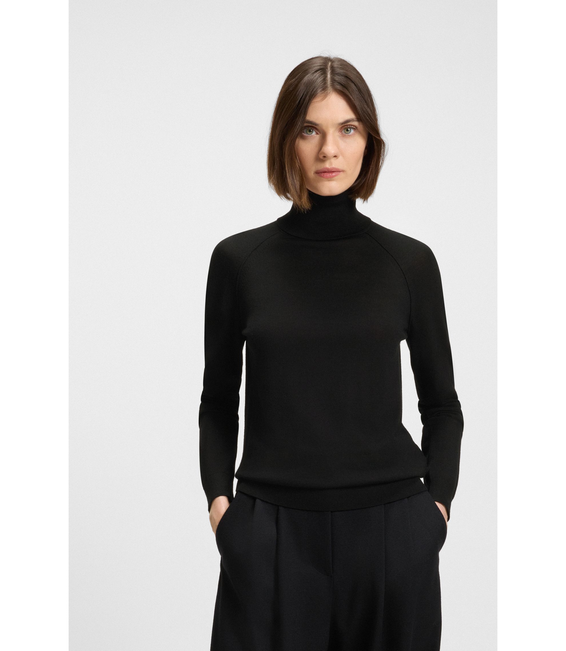 BOSS - Rollneck sweater in merino wool - Black