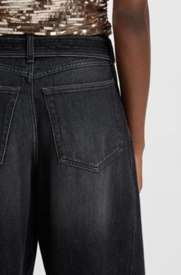 Vaqueros de pernera globo en denim r&iacute;gido negro con cintur&oacute;n, Negro