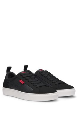 Deportivas de ca&ntilde;a baja con detalles de monograma, Negro