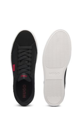 Deportivas de ca&ntilde;a baja con detalles de monograma, Negro