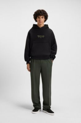 Deportivas de ca&ntilde;a baja con detalles de monograma, Negro