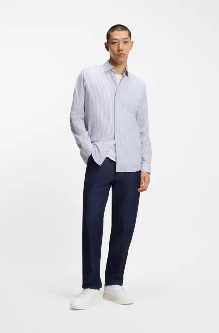 Mesh-trim trainers in faux leather