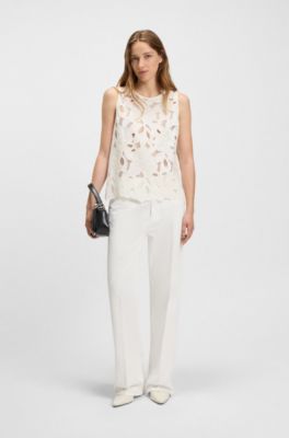 Sleeveless blouse with broderie anglaise, White