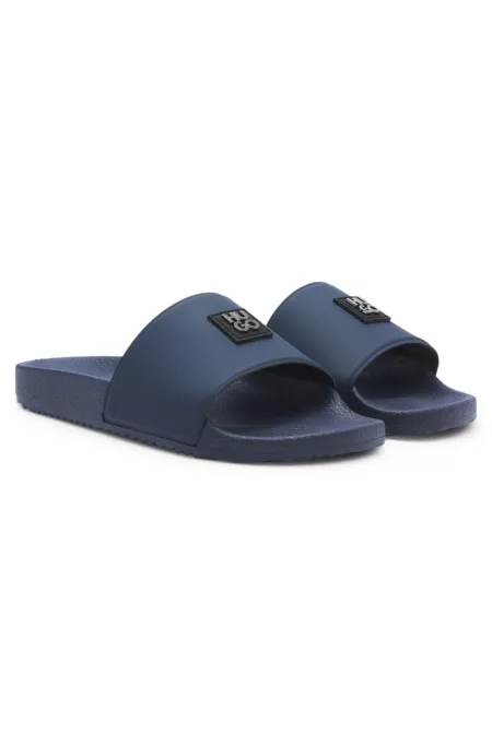 Italian-made slides with stacked-logo uppers