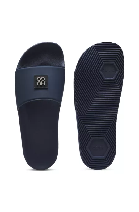 Italian-made slides with stacked-logo uppers