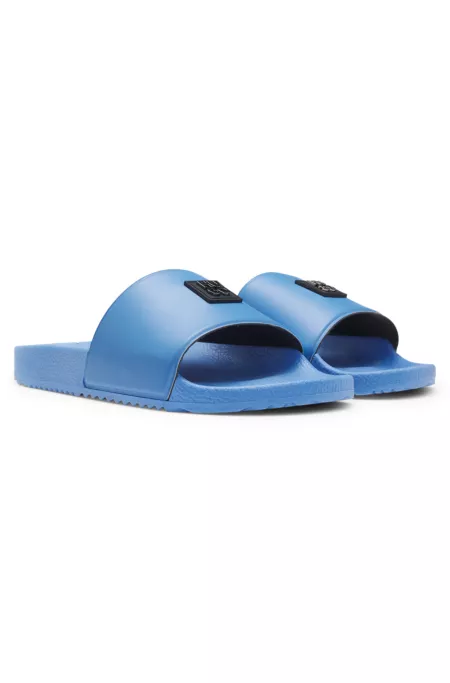 Italian-made slides with stacked-logo uppers