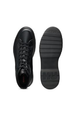 Botas de ca&ntilde;a alta en piel granulada, Negro