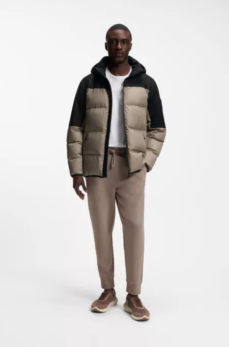 Water-repellent jacket with down filling and detachable hood