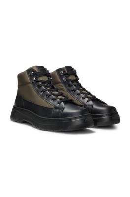 Botas de estilo monta&ntilde;ero con empeines de piel y tejido, Negro