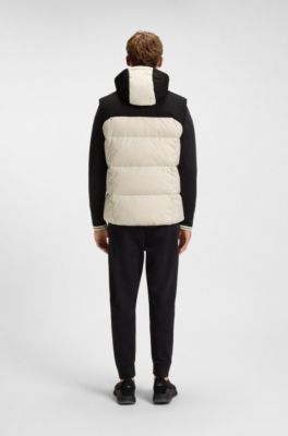 Water-repellent hooded vest with down filling, White