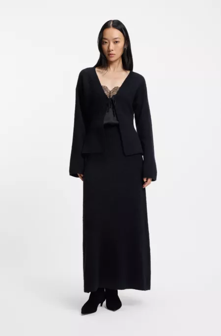 Knitted skirt with logo charm